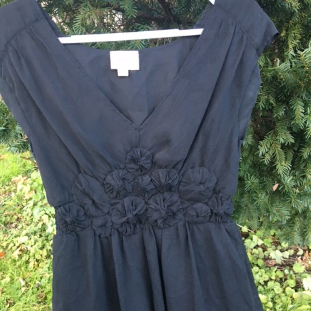Beautiful NWOT Black Party/professional top with flowers size 4